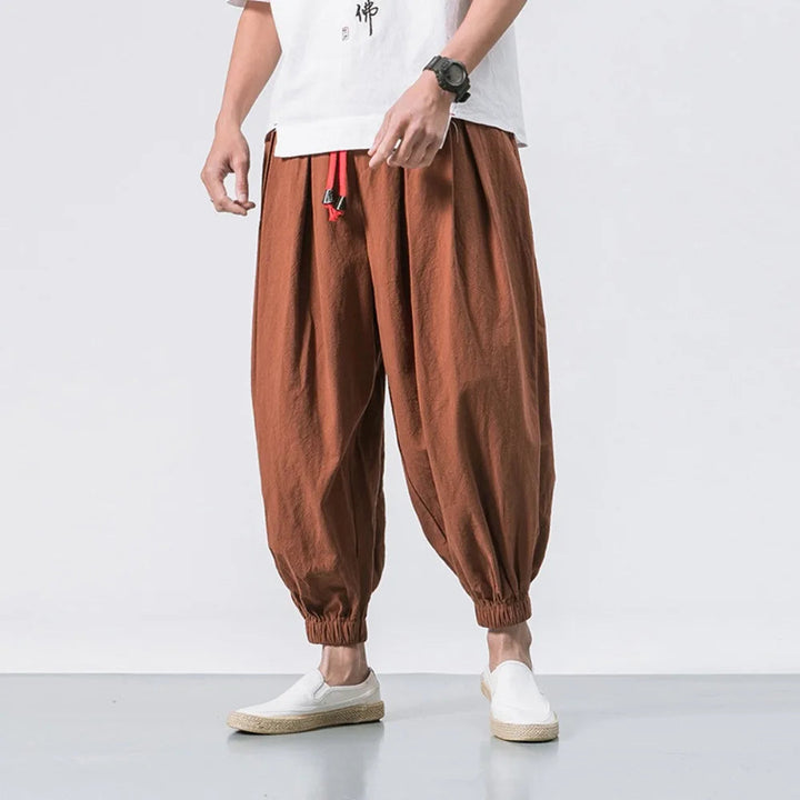 Back view of men's Stride baggy harem joggers, emphasizing comfortable, relaxed fit for casual wear.