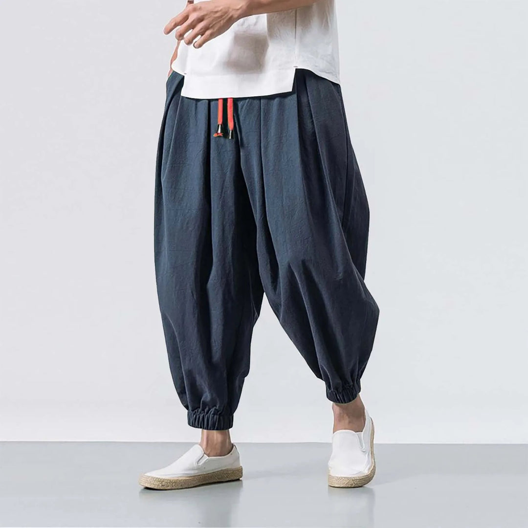 Front view of men's Stride baggy harem joggers, highlighting adjustable drawstring and comfortable relaxed fit.