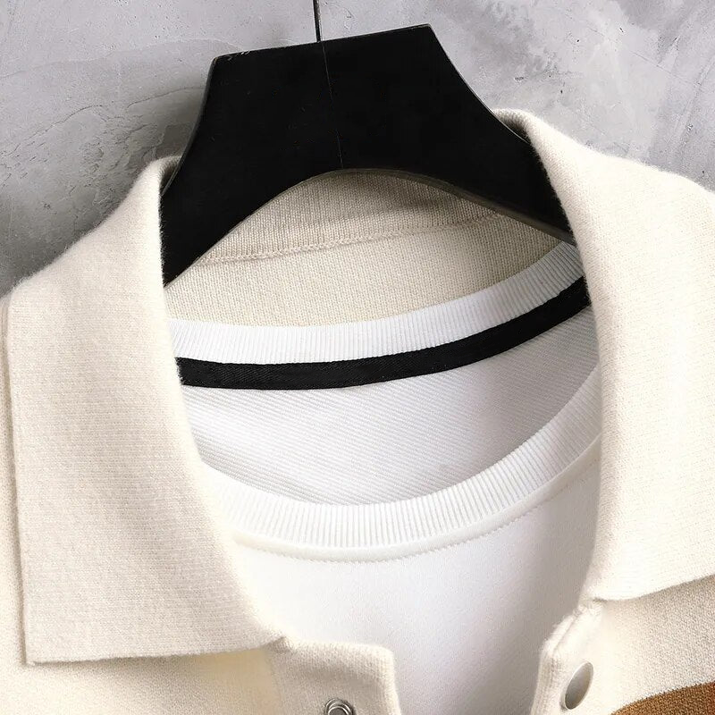 Stylish men's button-up cardigan featuring a bold striped pattern. Ideal casual outerwear for modern layering.