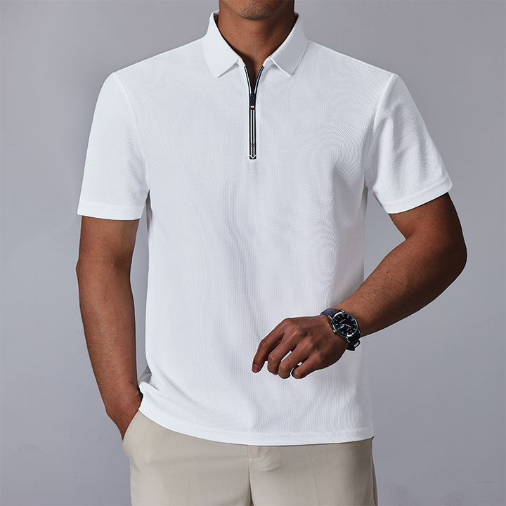 Sophisticated men's quarter-zip polo shirt in a comfortable cotton blend, ideal for casual and business casual wear.