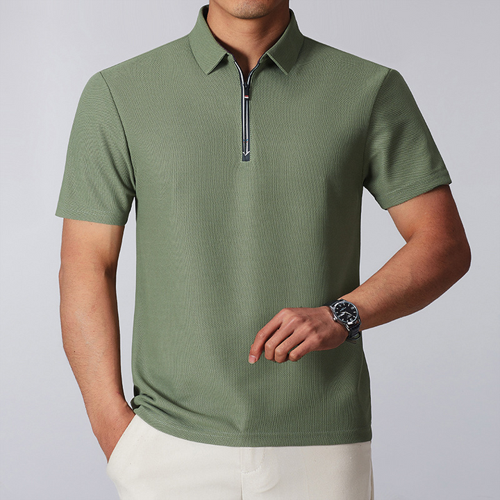 Casual yet refined men's quarter-zip polo shirt. Cotton blend, structured, perfect for golf or everyday style.