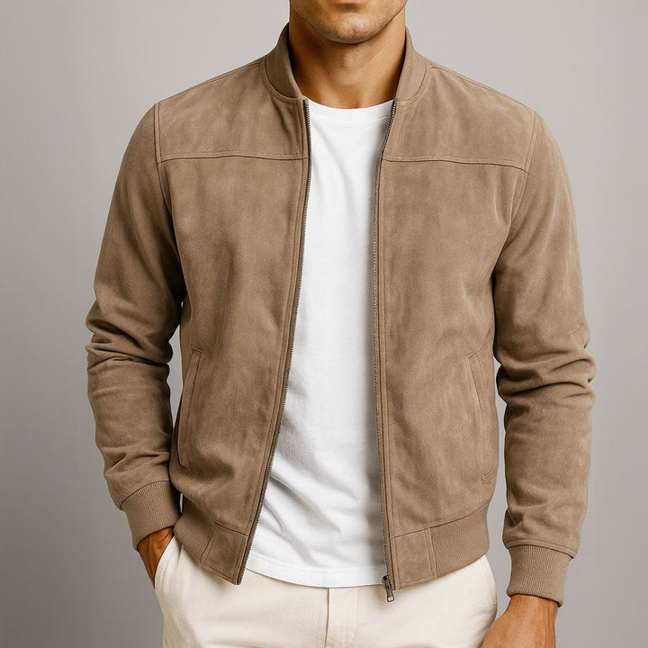 Close-up of a sophisticated men's structured bomber jacket, showcasing tailored fit & premium fabric.