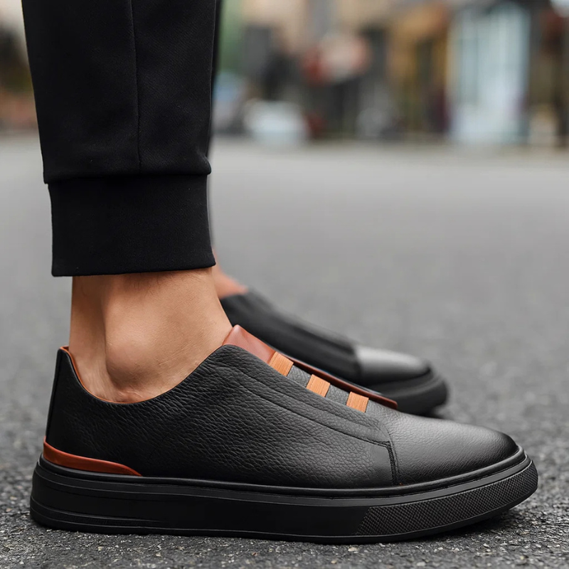 Sleek men's Chelsea sneakers, blending classic style with athletic comfort for versatile casual wear.