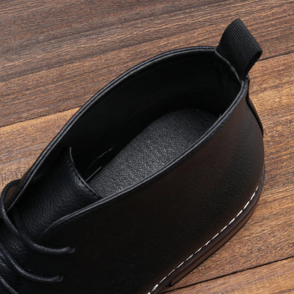 On-foot shot: Men's stylish black chukka boots, comfortable and fashionable casual footwear.