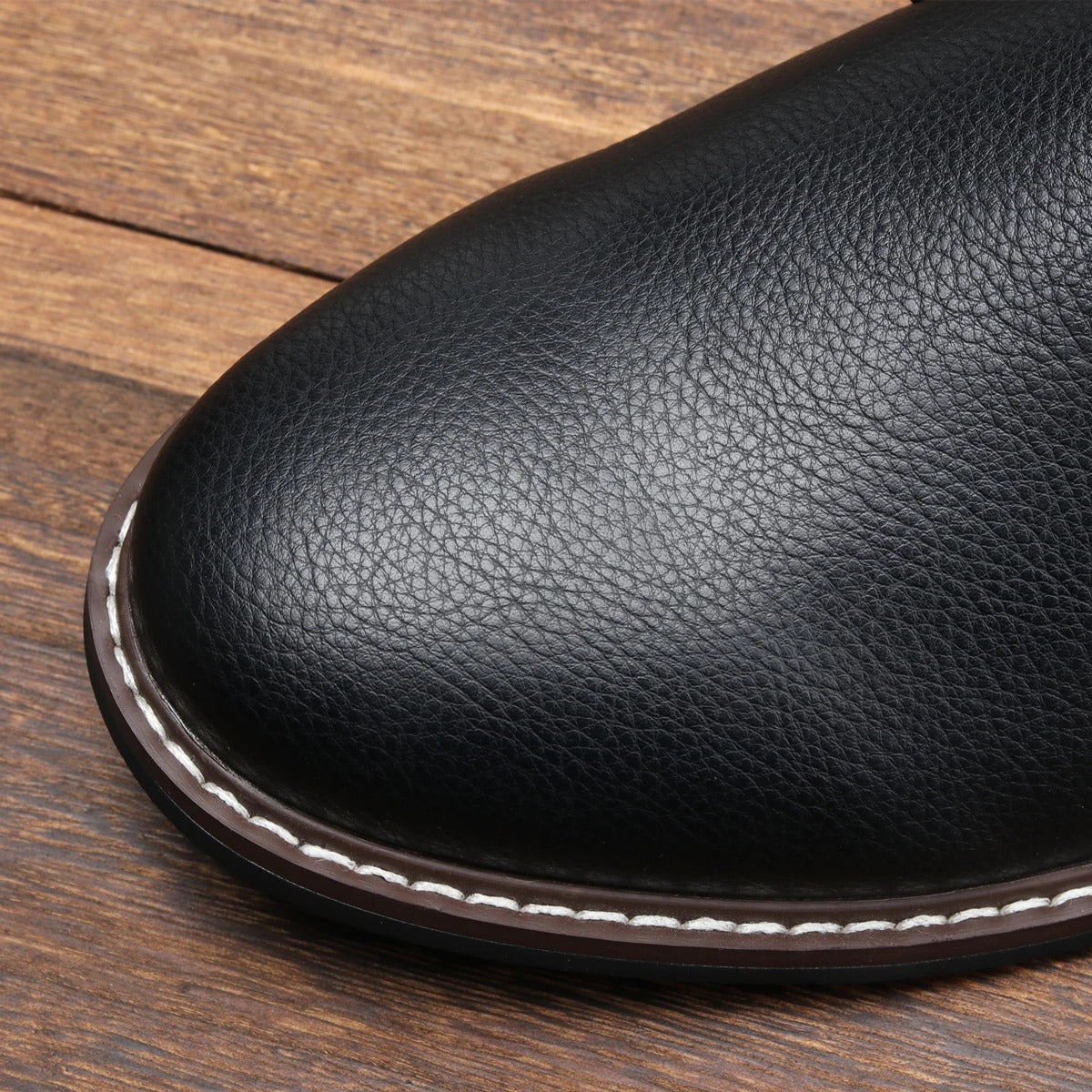 Durable sole detail on black chukka boots for men, built for everyday comfort and style.