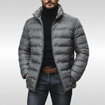 Front view of a men's stylish black puffer jacket, providing ultimate warmth for cold winter weather.