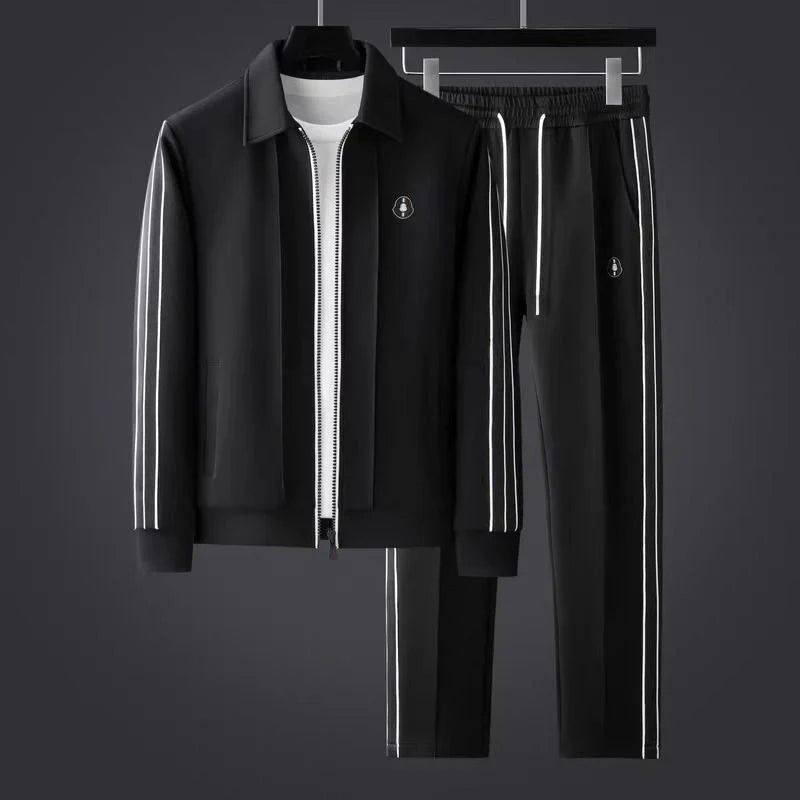 Men's stylish black & white striped activewear set. Two-piece athleisure outfit for comfort & modern fashion.