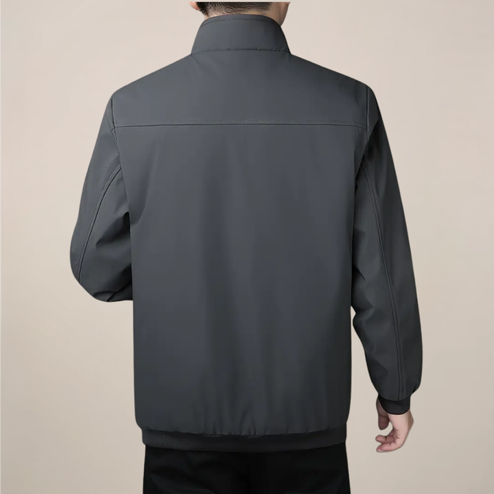 Warm lined men's thermal winter coat featuring a stand collar and full zip-up for cold weather comfort.
