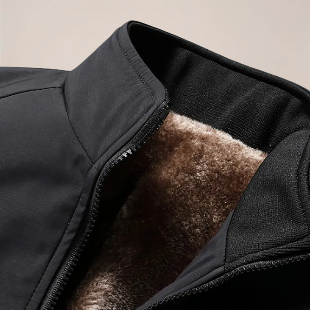 Stylish men's warm lined zip-up jacket with stand collar, a thermal coat for cold weather casual style.