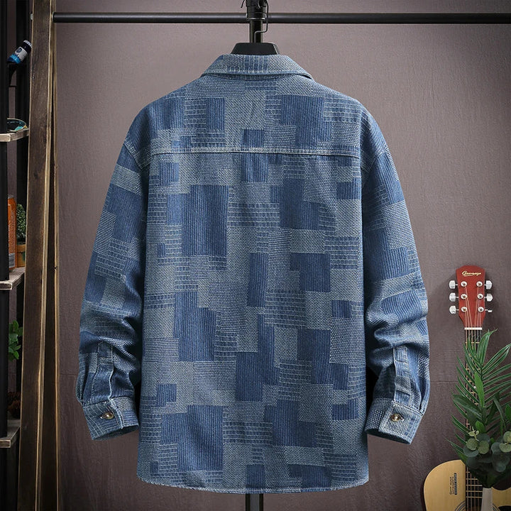 Versatile men's patchwork denim shirt in blue & black, featuring snap buttons. Ideal for casual fashion.
