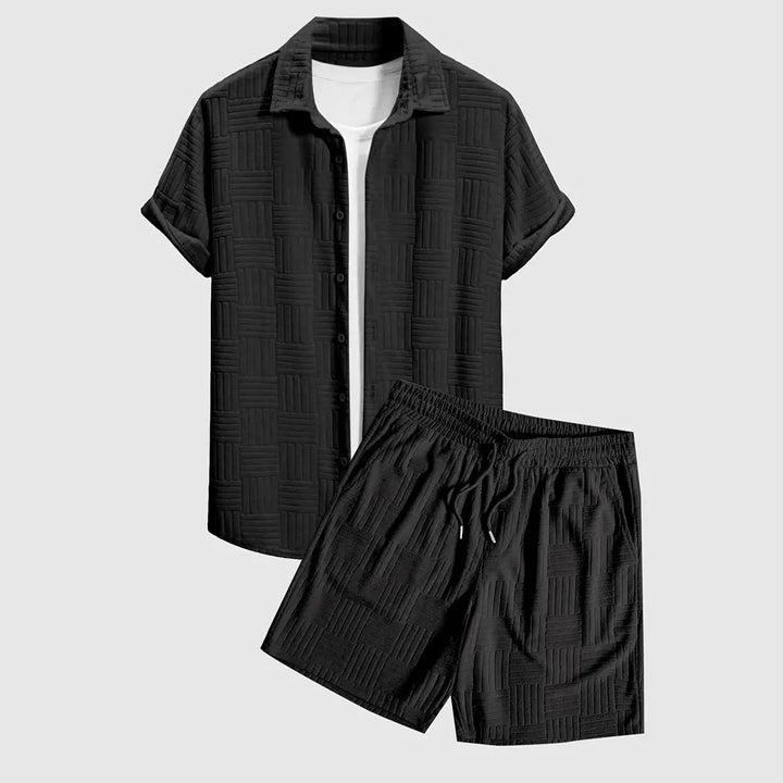 Black men's casual lounge set, a comfortable & stylish two-piece top and bottom outfit for relaxed everyday wear.