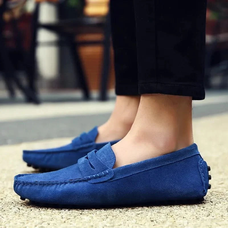 Elegant burgundy men's slip-on loafers. Comfortable, stylish footwear for formal events or fashion.