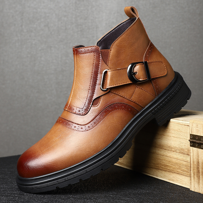 Man wearing stylish brogue ankle boots with jeans, showcasing versatile & comfortable men's fall fashion.