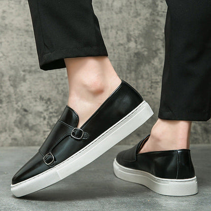 Side view of men's sleek black monk strap loafers, designed for ultimate comfort and style.