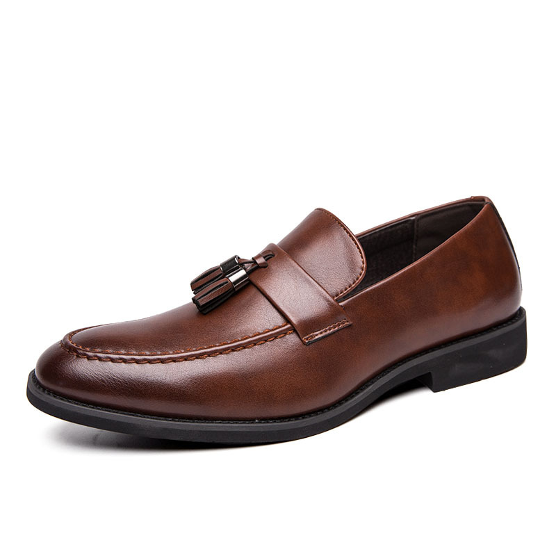 Fashion-forward men's dress loafers with tassels. Stylish slip-on footwear, perfect for modern men.