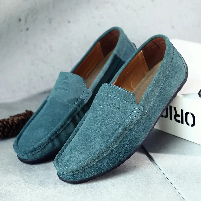 Stylish black men's dress loafers, comfortable slip-on shoes for formal attire.