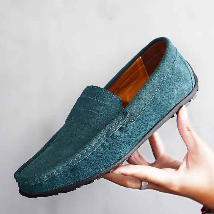 Versatile navy men's walking loafers, perfect slip-on footwear for comfort.
