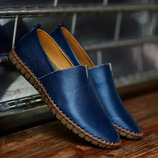Men's stylish brown slip-on summer loafers, perfect for casual comfort in warm weather.