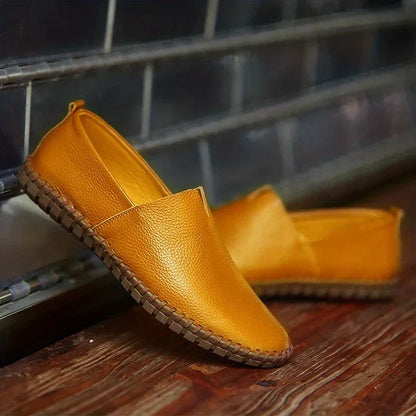 Stylish men's casual loafers, a fashionable slip-on summer shoe providing both comfort and elegance.