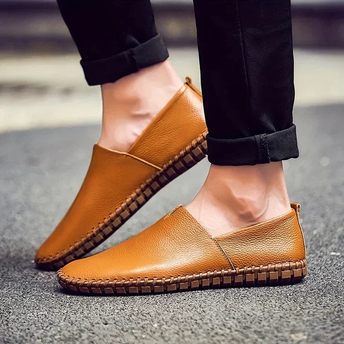 Navy blue men's stylish summer loafers, breathable slip-on casual shoes for warm weather comfort.