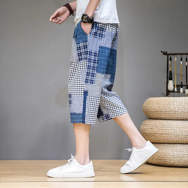 Men's stylish capris shorts with unique patch design, perfect for casual summer wear.