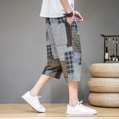 Comfortable men's gray capris shorts featuring a unique patch design, ideal for street fashion.