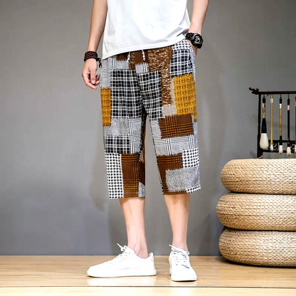 Versatile men's shorts with a unique patch design, perfect for durable casual and summer wear.