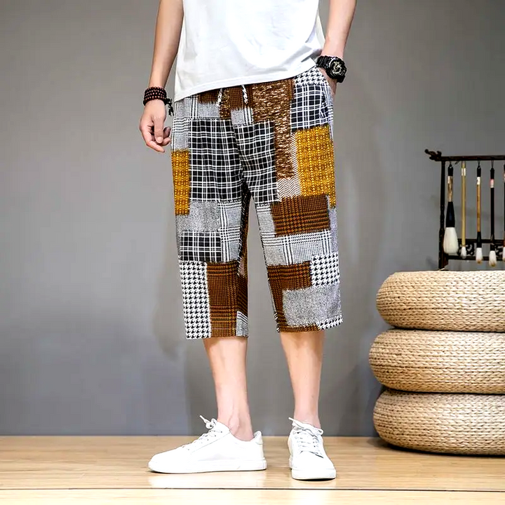 Versatile men's shorts with a unique patch design, perfect for durable casual and summer wear.