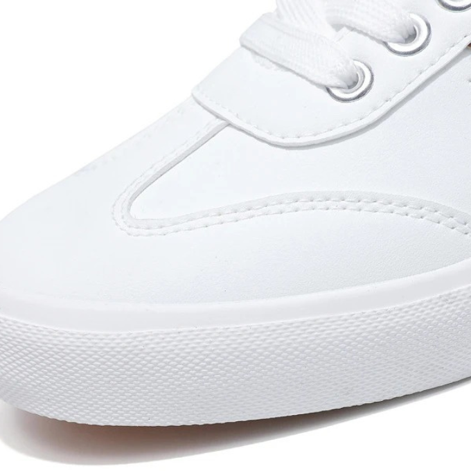 Close-up of men's stylish black casual sneakers, highlighting design for comfortable everyday wear.
