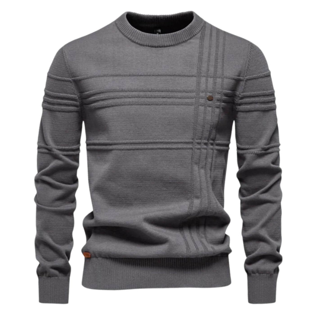 Comfortable men's long sleeve sweater, versatile for casual or smart-casual occasions with refined details.