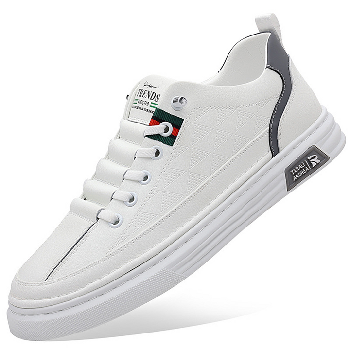 Premium men's casual sneakers with intricate embossed design for sophisticated everyday wear.