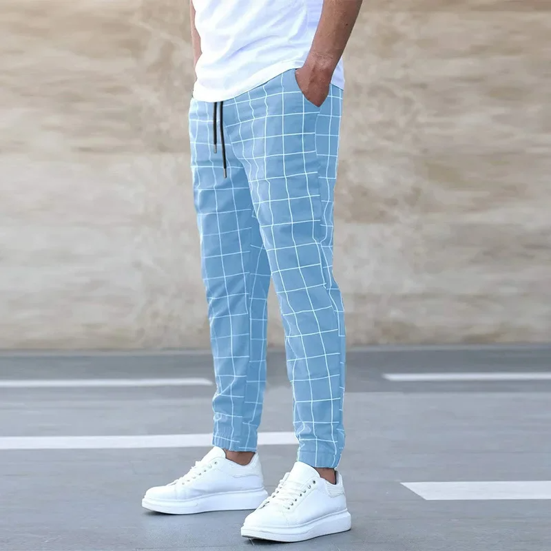 Men's stylish checkered jogger pants, tapered fit, perfect for casual wear & street style comfort.