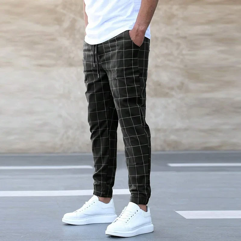 Men's relaxed fit checkered jogger pants. Tapered design offers comfort & contemporary style.