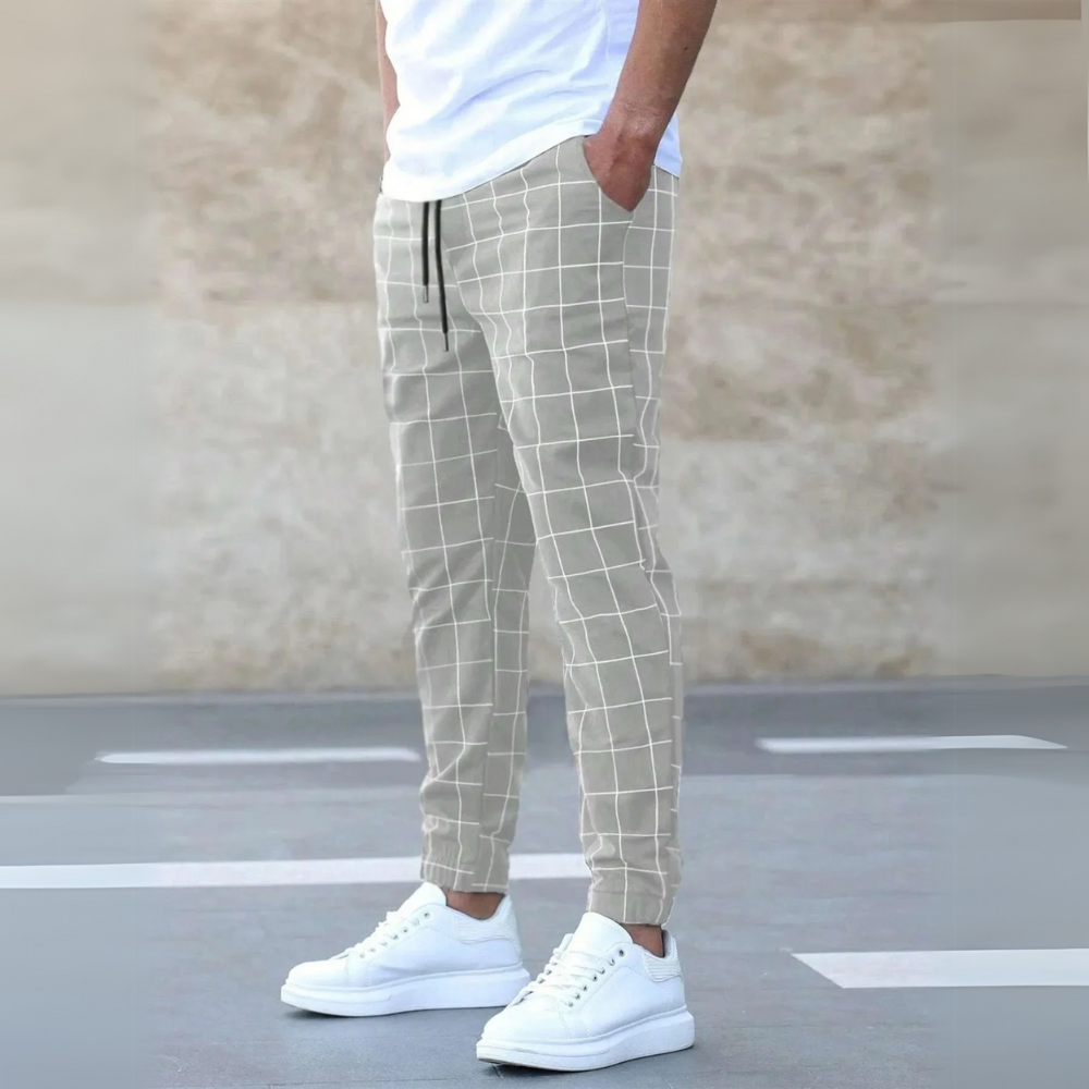 Versatile men's checkered joggers with a tapered fit, blending athletic comfort & casual style.