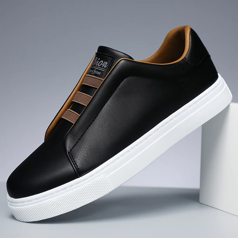 Fashionable men's Chelsea slip-on sneakers, offering modern style and comfort for daily footwear.