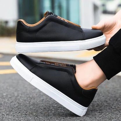 Sleek men's slip-on sneakers with Chelsea style, ideal for contemporary casual fashion.