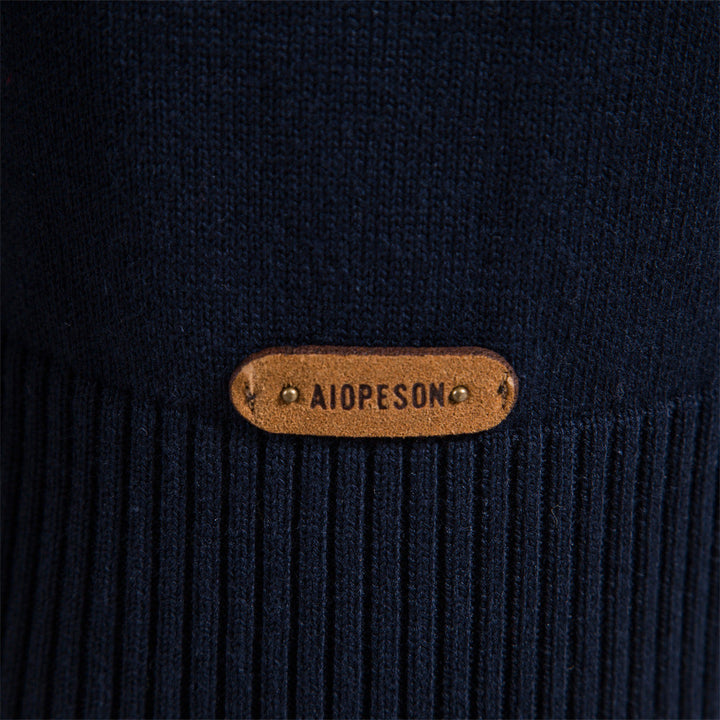 Sophisticated men's colorblock half-zip sweater, a warm layering piece for fall/winter.