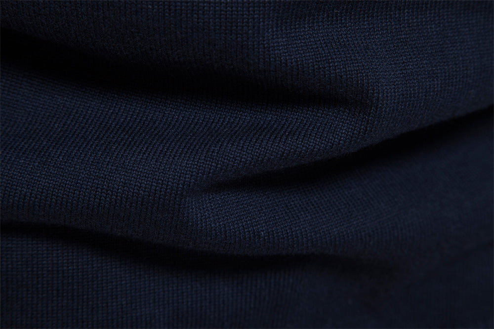 Men's fall apparel: Stylish half-zip colorblock sweater, ideal for modern layering.