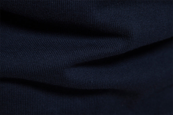 Men's fall apparel: Stylish half-zip colorblock sweater, ideal for modern layering.