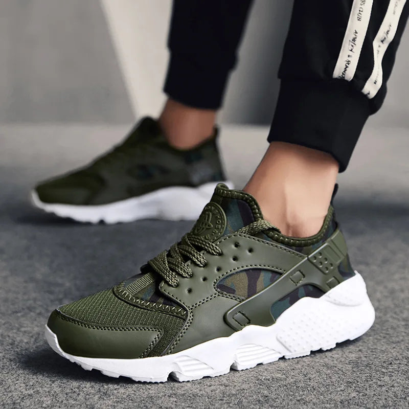Side view of men's walking shoes, showcasing modern design & comfort features for daily wear.