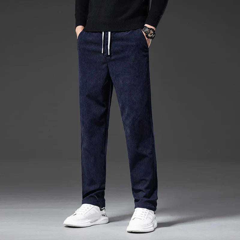 Close-up of durable men's corduroy fabric, showcasing the soft texture & quality of these stretch pants.
