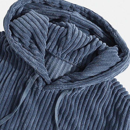Close-up of the soft corduroy texture on a men's casual hoodie, showcasing quality and fall comfort.
