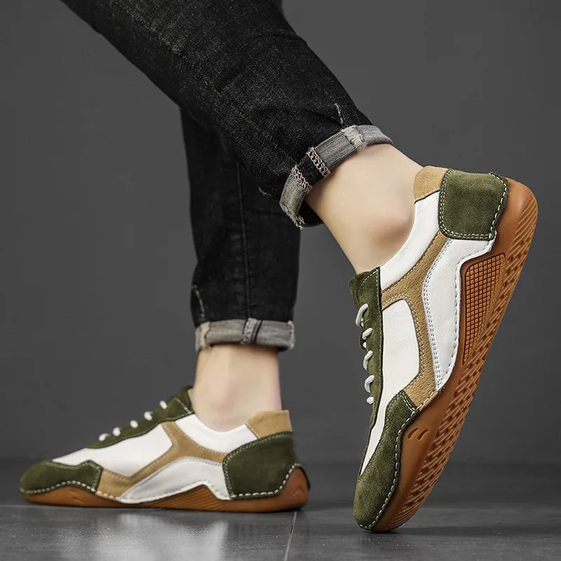 Stylish men's low-top sneakers featuring a classic gum sole, great for casual & streetwear looks.