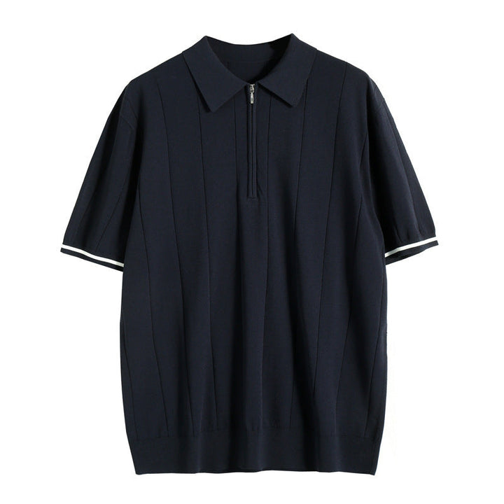 Detailed view of the half-zip collar on a men's stylish polo shirt, emphasizing modern design and quality.