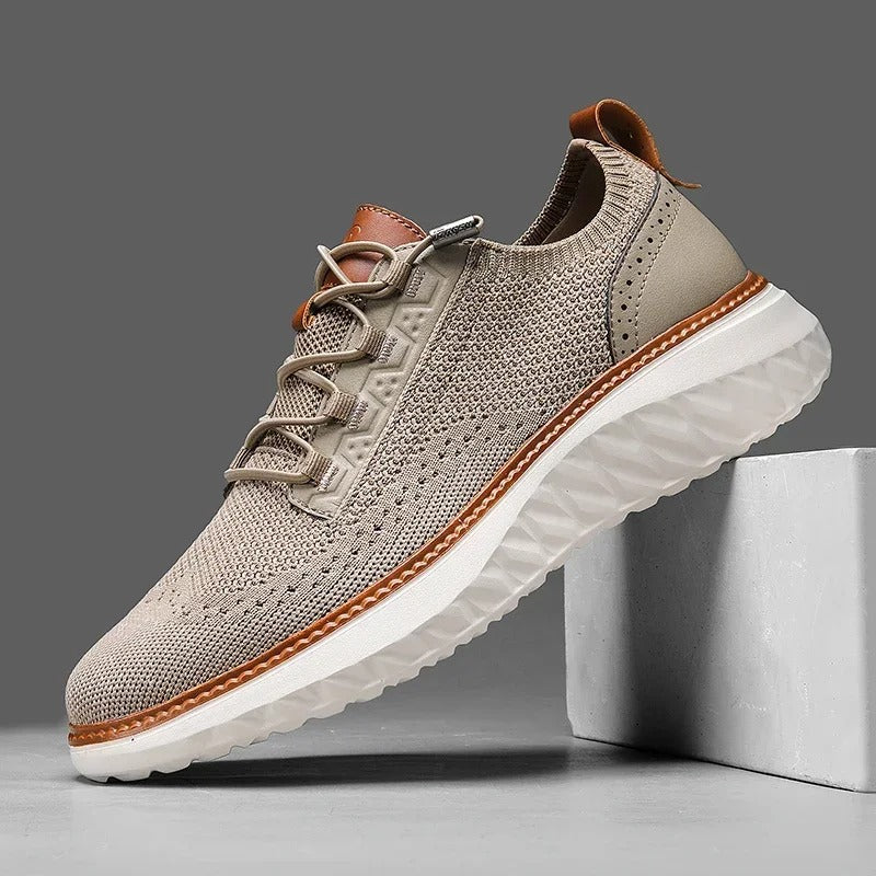 Modern men's blue knit slip-on sneakers with athletic style for comfort & everyday appeal.