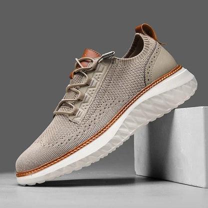 Modern men's blue knit slip-on sneakers with athletic style for comfort & everyday appeal.