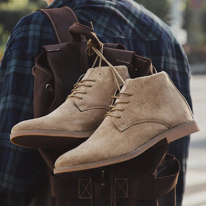 Men's stylish lace-up Chelsea boots in premium brown leather, perfect for rugged everyday wear & comfort.