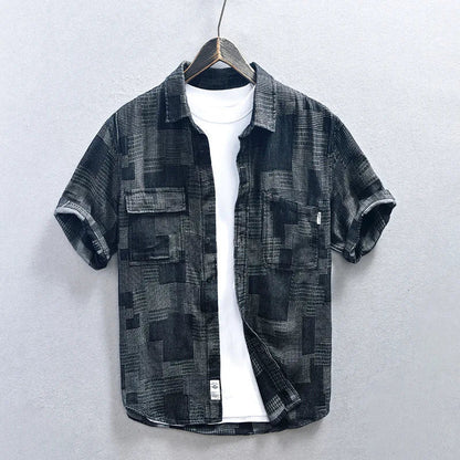 Modern men's multi-pocket long-sleeve button-down shirt, a stylish and versatile option for daily wear.