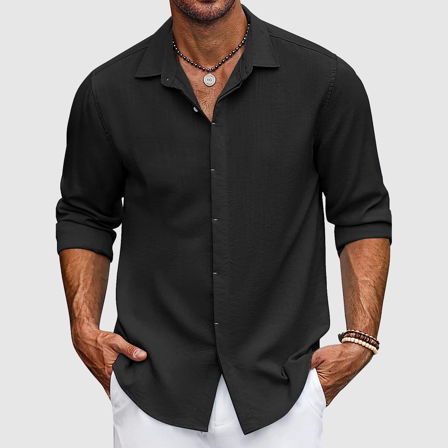 Man wearing a versatile long sleeve button-down casual shirt, a stylish collared top for men's fashion and everyday outfits.