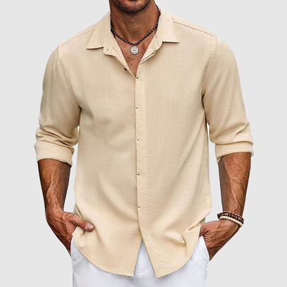 Folded men's long sleeve button-down shirt, a classic and stylish collared top ideal for men's casual or dress clothing.